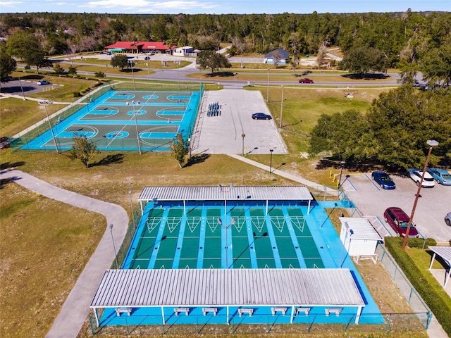 aerial view featuring a view of trees