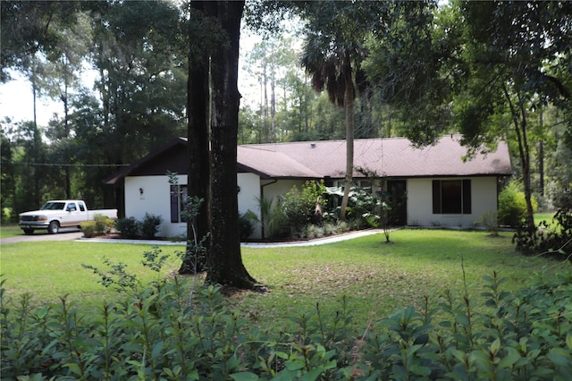 view of front of home with a front yard