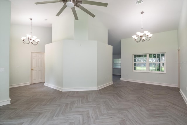 unfurnished room featuring parquet floors, ceiling fan with notable chandelier, and high vaulted ceiling