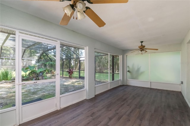 unfurnished sunroom with a wealth of natural light and ceiling fan