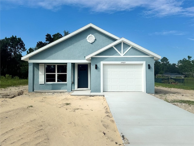 view of front of home featuring a garage