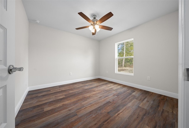 unfurnished room featuring dark hardwood / wood-style flooring and ceiling fan