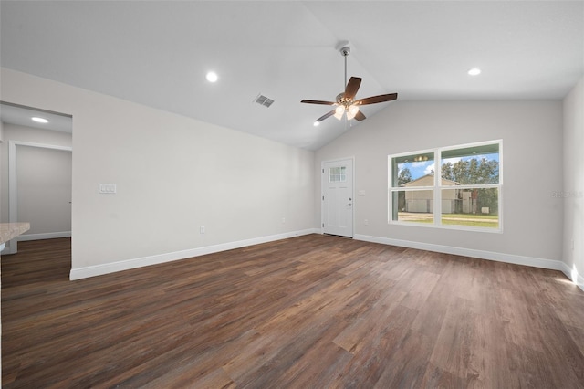 unfurnished living room featuring dark wood-type flooring, lofted ceiling, and ceiling fan