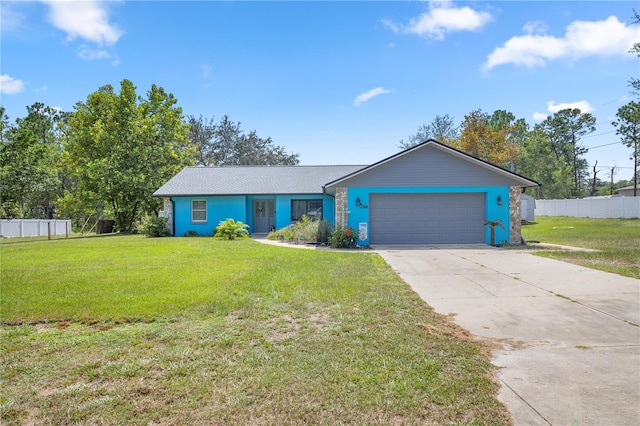 single story home with a garage and a front yard