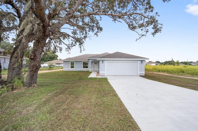 ranch-style house with a front yard and a garage