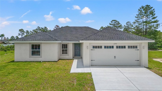 ranch-style home with an attached garage, a shingled roof, driveway, and a front yard