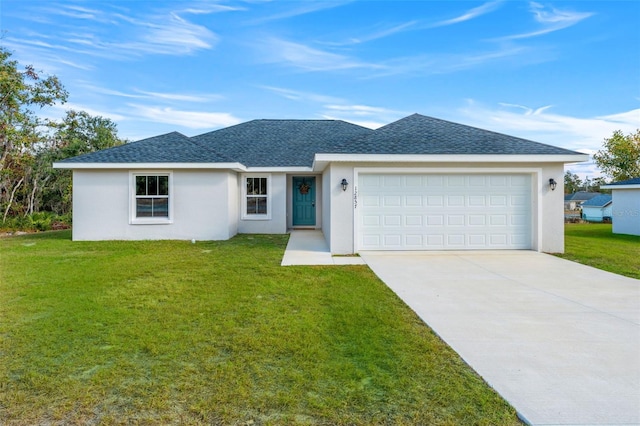 ranch-style house featuring a front lawn, an attached garage, driveway, and stucco siding