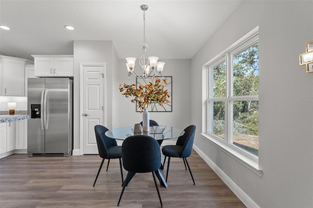 dining room featuring recessed lighting, a chandelier, baseboards, and wood finished floors