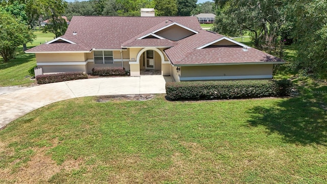 view of front of house with a front yard