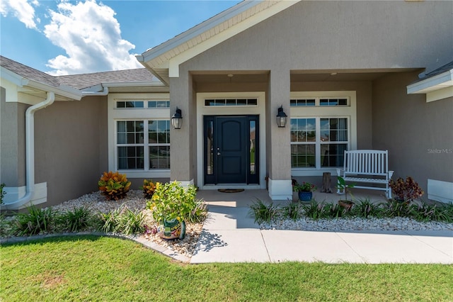 property entrance featuring covered porch