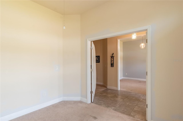 corridor with light carpet