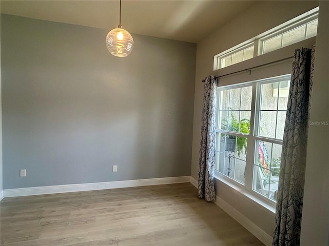 25 NW 45th Loop, Ocala, FL 34475 - spare room with light wood-type flooring and baseboards