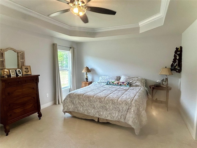 25 NW 45th Loop, Ocala, FL 34475 - bedroom with a tray ceiling, baseboards, light colored carpet, a ceiling fan, and ornamental molding