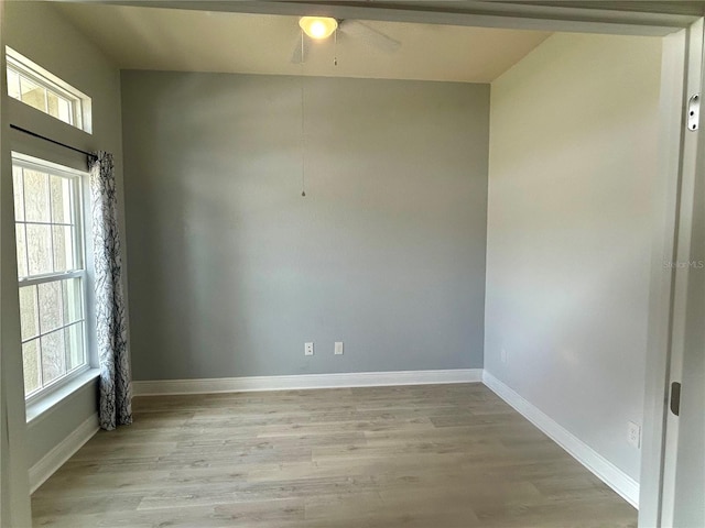 25 NW 45th Loop, Ocala, FL 34475 - unfurnished room with light wood finished floors, baseboards, and a ceiling fan