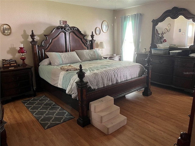 bedroom featuring hardwood / wood-style floors