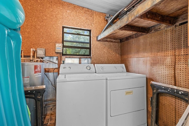 washroom featuring washer and dryer and electric water heater