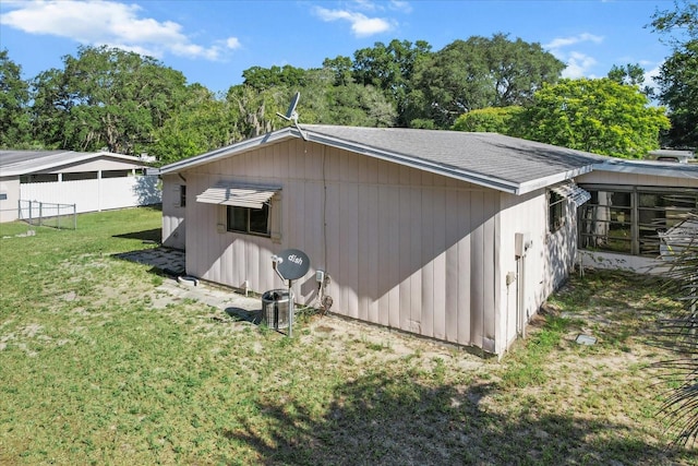 view of outdoor structure with a yard