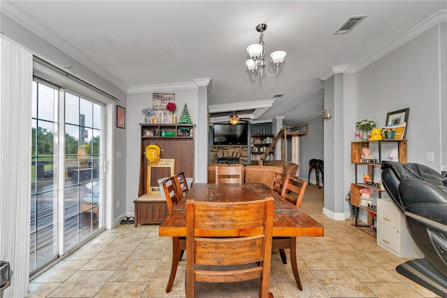 dining space with crown molding, light tile patterned flooring, and ceiling fan with notable chandelier