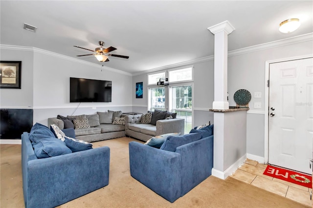 living room featuring light tile patterned floors, ornate columns, ceiling fan, and ornamental molding