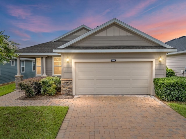 craftsman house featuring a garage