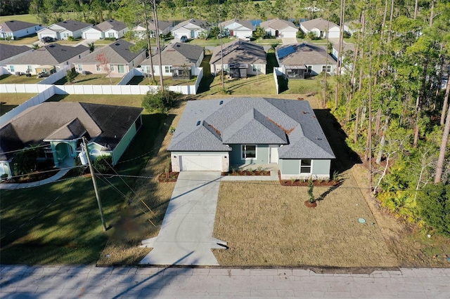 drone / aerial view with a residential view