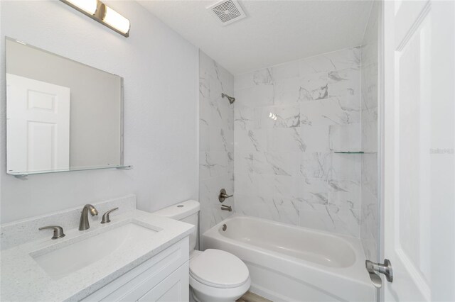 bathroom featuring vanity, shower / tub combination, toilet, and visible vents