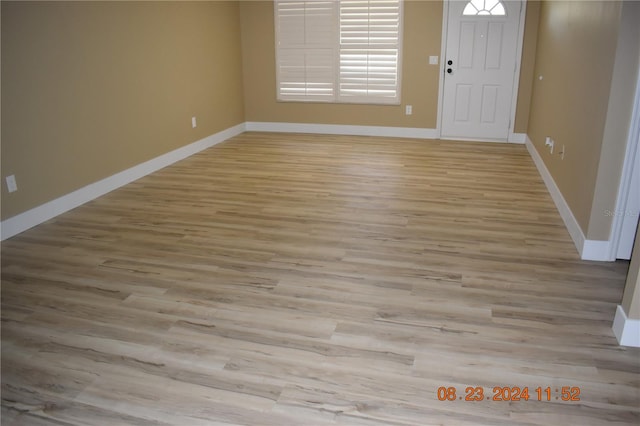 foyer with light hardwood / wood-style flooring