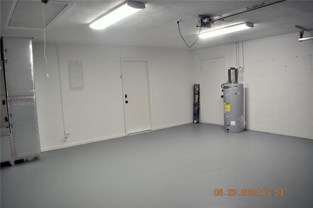 garage featuring water heater