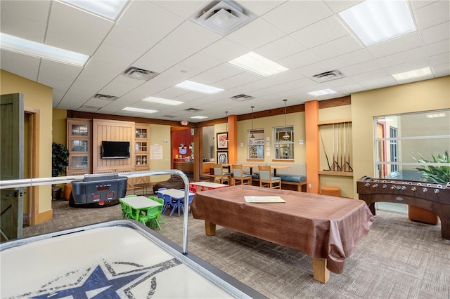 recreation room with visible vents and carpet floors