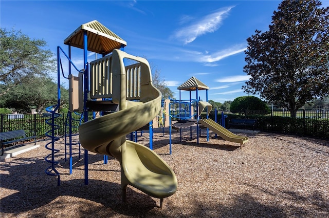 community jungle gym with fence