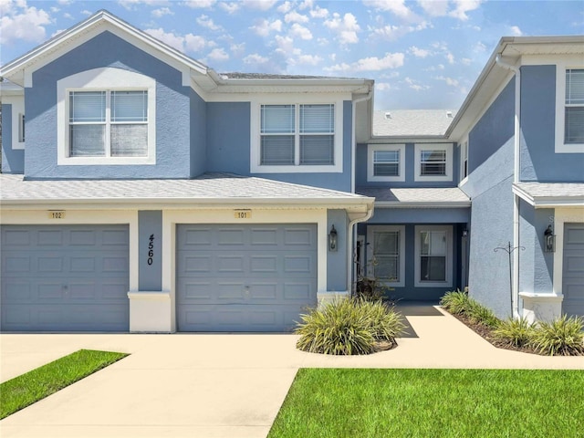 view of property featuring a garage