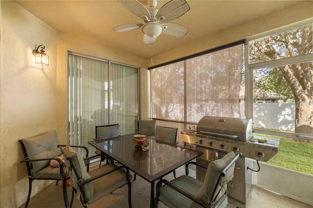 sunroom / solarium with ceiling fan