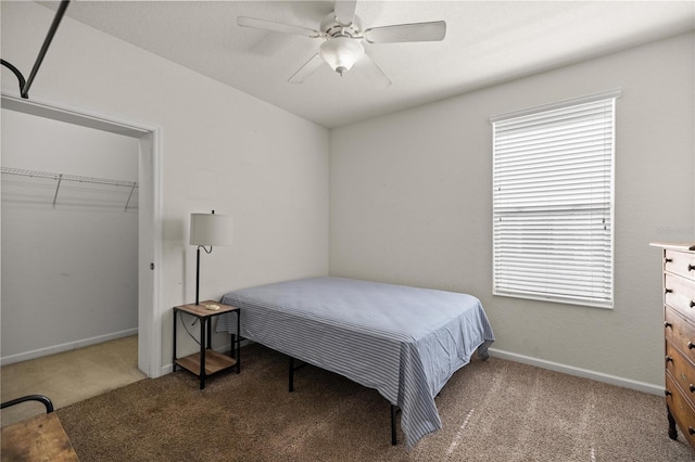 bedroom featuring a closet, carpet flooring, a ceiling fan, and baseboards