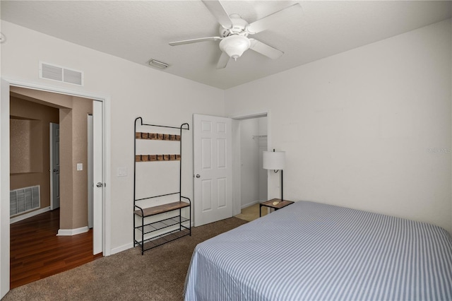 bedroom featuring visible vents, baseboards, and carpet flooring