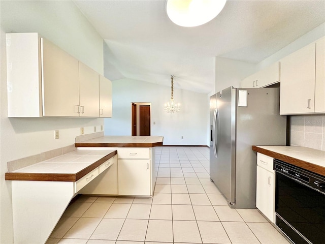 kitchen featuring lofted ceiling, black dishwasher, kitchen peninsula, and light tile patterned flooring