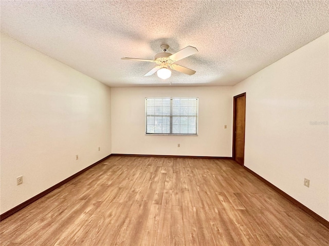 unfurnished room with a textured ceiling, ceiling fan, and wood-type flooring