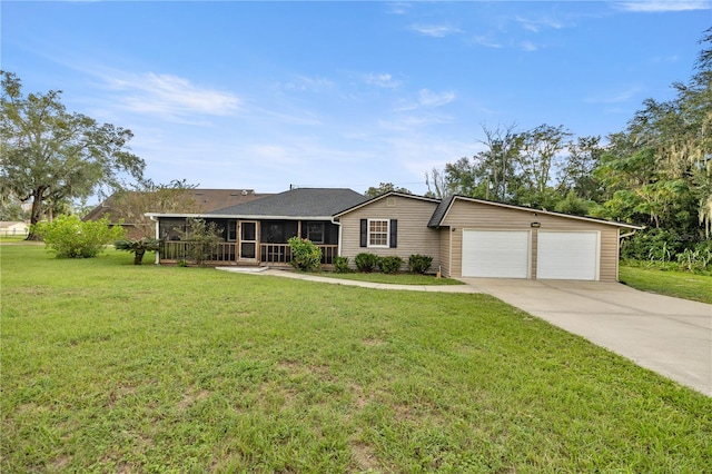 ranch-style home with a front lawn and a garage