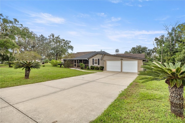 ranch-style house with a front lawn and a garage