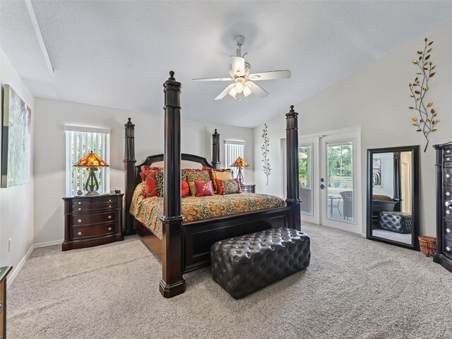 bedroom with lofted ceiling, access to exterior, ceiling fan, and light colored carpet