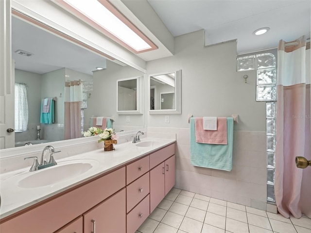 bathroom with vanity and tile patterned floors