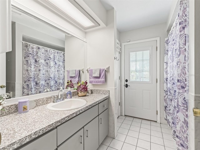 bathroom with vanity and tile patterned floors