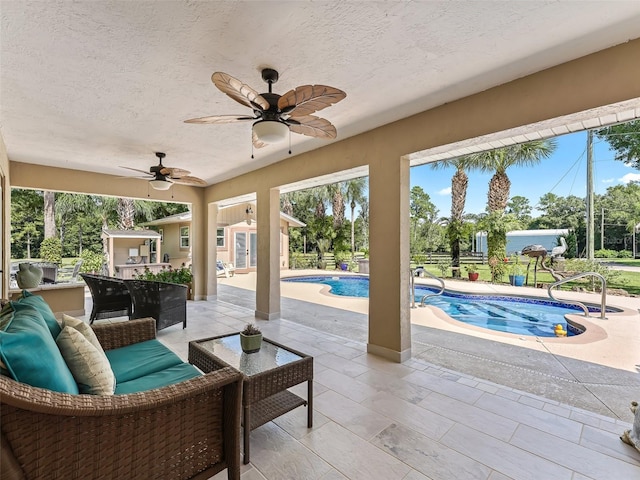 view of patio with ceiling fan