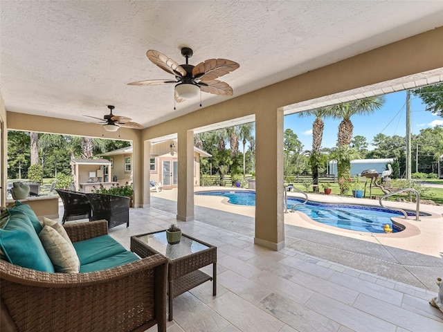 sunroom / solarium with a swimming pool