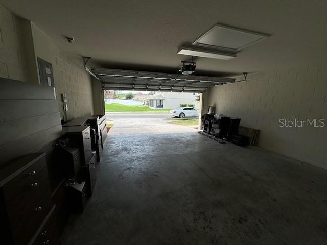 garage featuring a garage door opener