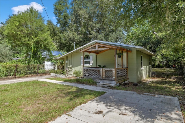 bungalow with a front lawn