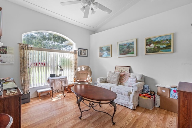 sitting room featuring light wood-type flooring, a healthy amount of sunlight, and ceiling fan