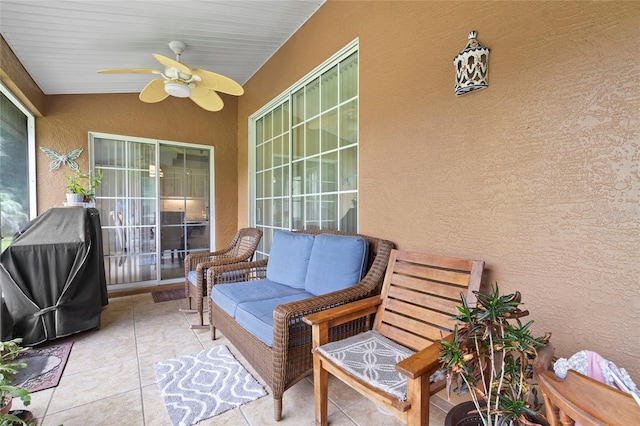 sunroom / solarium featuring vaulted ceiling and ceiling fan