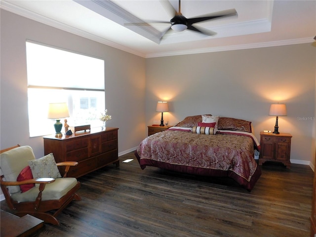 bedroom featuring ceiling fan, ornamental molding, and dark wood-type flooring