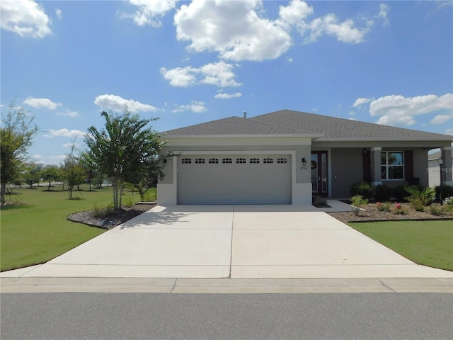 single story home with a front lawn and a garage