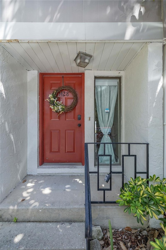 1428 SW 25th Pl, Gainesville, FL 32608 - property entrance featuring stucco siding